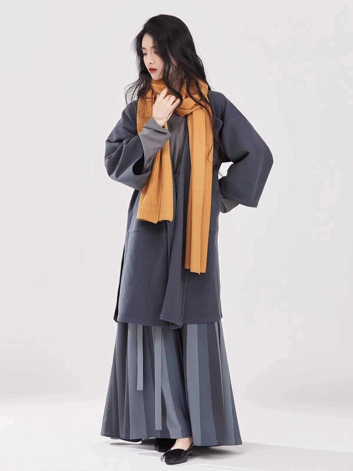 Modern charcoal Tang Dynasty Hanfu layered outfit showing concealed front placket and flowing pleated wrap skirt
