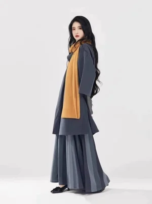 Modern Tang Dynasty Hanfu set in charcoal grey with striped wrap skirt shown in left side full body view