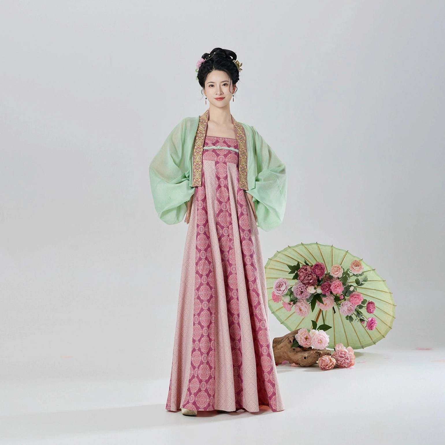 Full front view of modern Tang Dynasty Hanfu set highlighting the pink classical floral skirt pattern and flowing proportions
