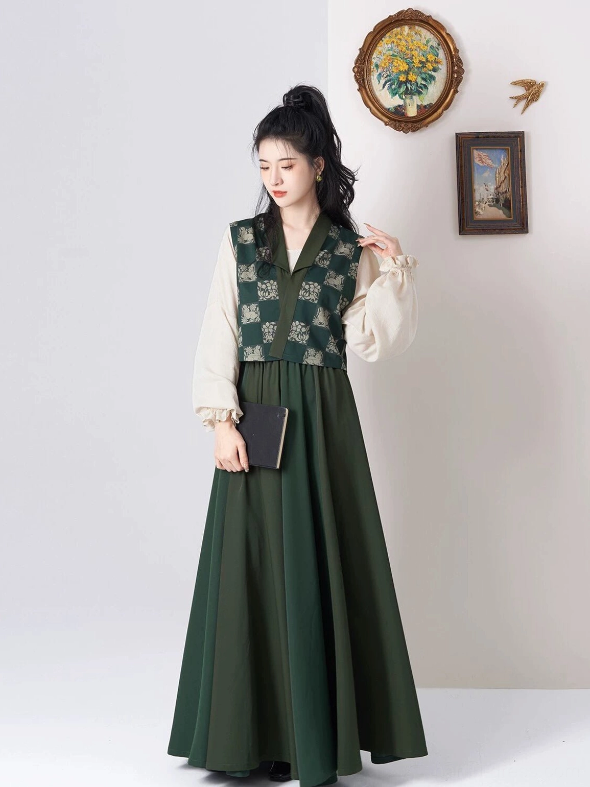 Full body front view of a modern Tang Dynasty Hanfu outfit with dark green floral jacquard Beizi, off white lantern sleeve top, and flowing eight panel maxi skirt