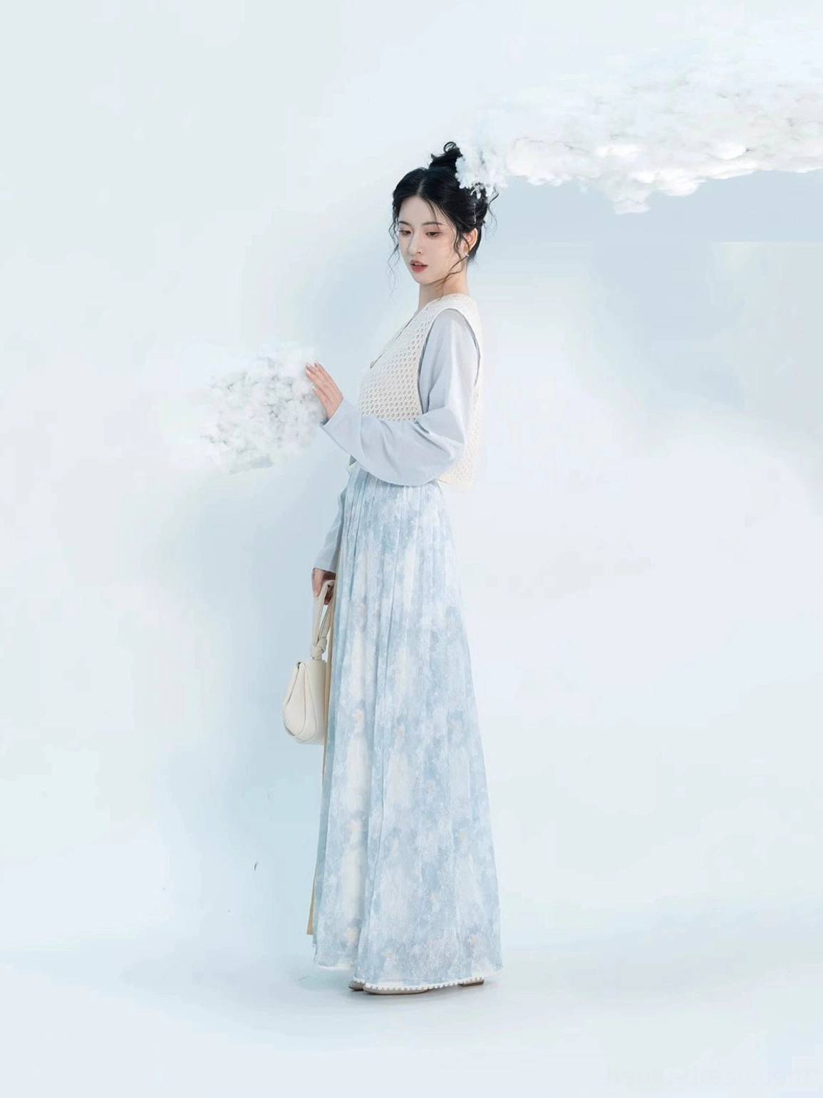 Side view of modern Tang style Hanfu set showing the layered Beizi silhouette pleated skirt and flowing traditional profile