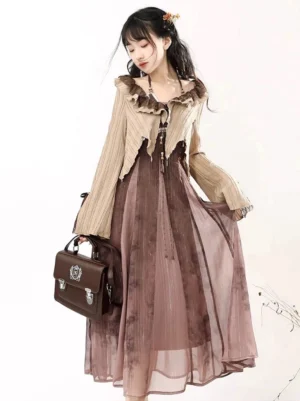 Full-body front view of a modern Tang style Hanfu dress set with a khaki ruffled cropped cardigan and flowing brown gradient ink-print dress
