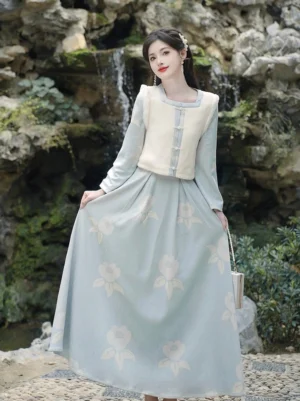 Modern Tang style Hanfu two-piece outfit with dusty blue floral dress and off-white square-neck vest with Chinese frog buttons