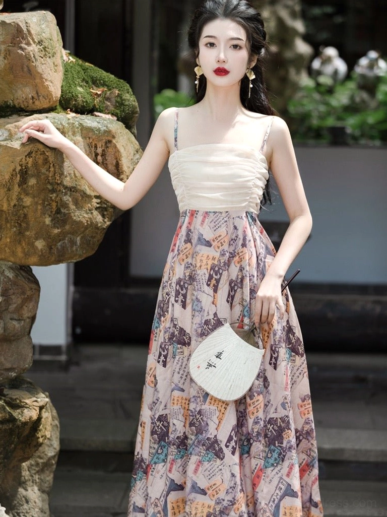 Front view of modern Tang style hanfu maxi dress with ruched spaghetti strap bodice, vintage inspired printed skirt and sheer outer cardigan