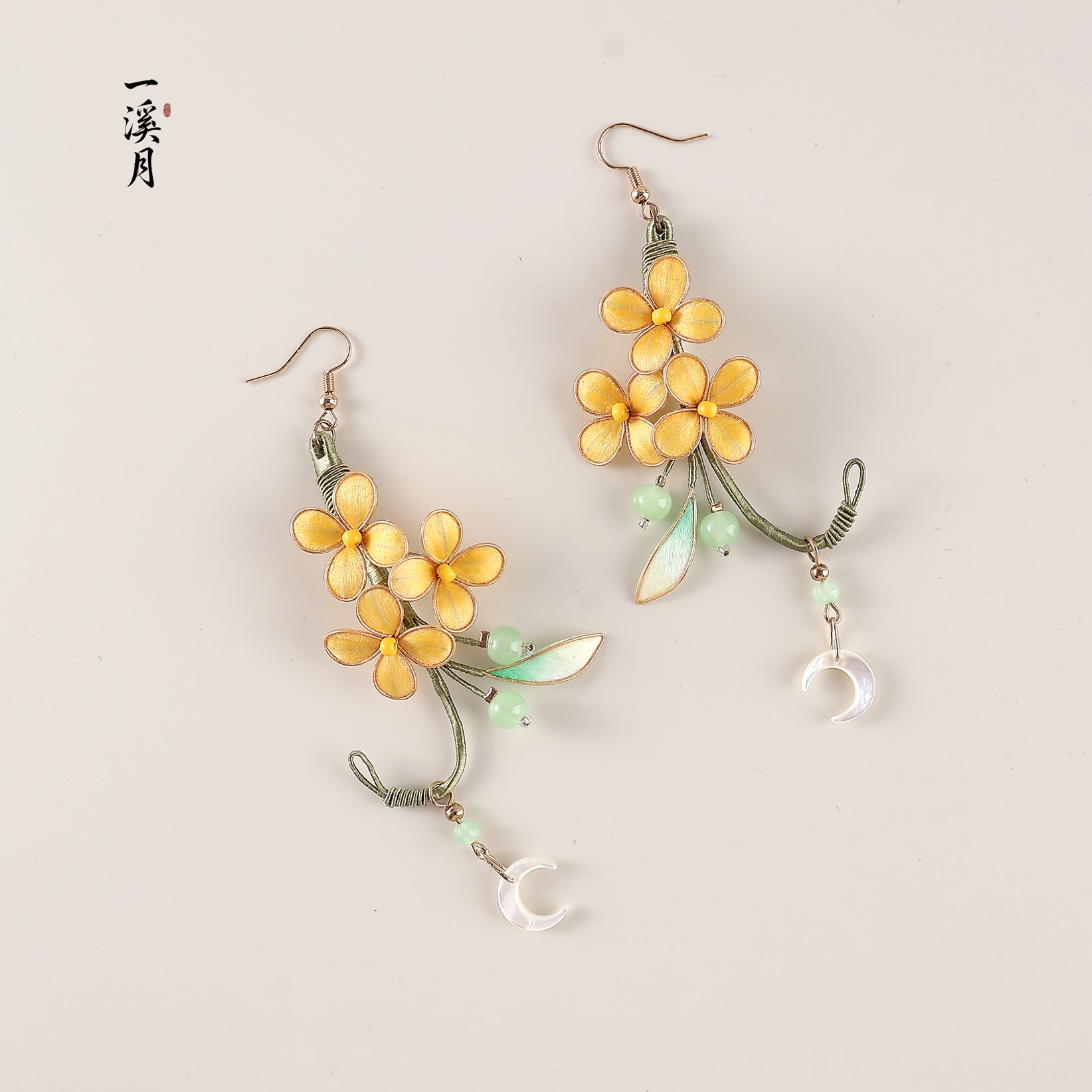 Chinese osmanthus hook earrings with yellow blossoms green leaf details winding branches and dangling crescent moon pendants