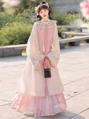 Pink Moonlit Flowers Ming Dynasty Hanfu full set with bijia vest, embroidered robe, cloud collar and pleated skirt in a classical Chinese garden