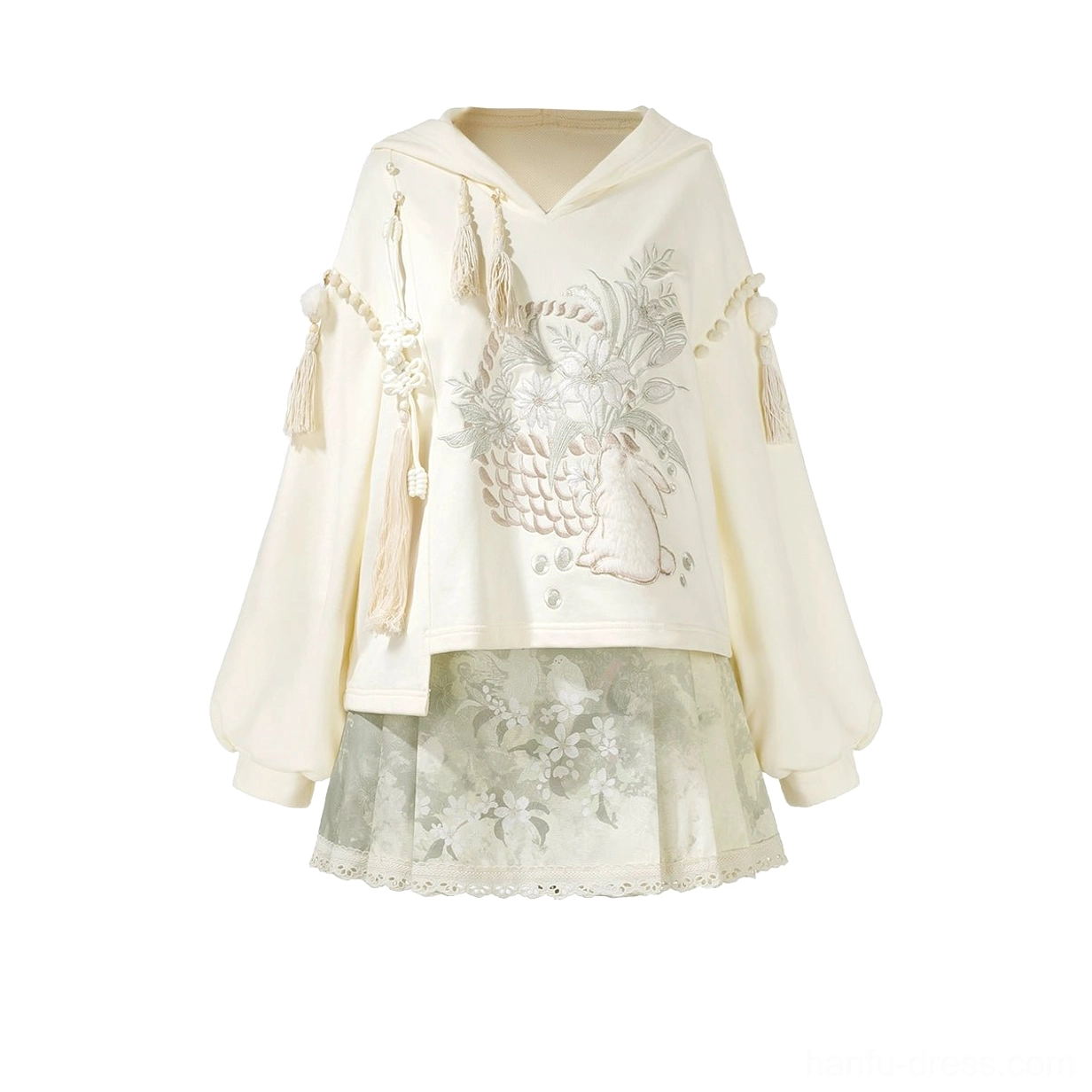 Flat lay of Morning Garden modern Hanfu two piece set with cream embroidered tassel hoodie and green printed mamian skirt