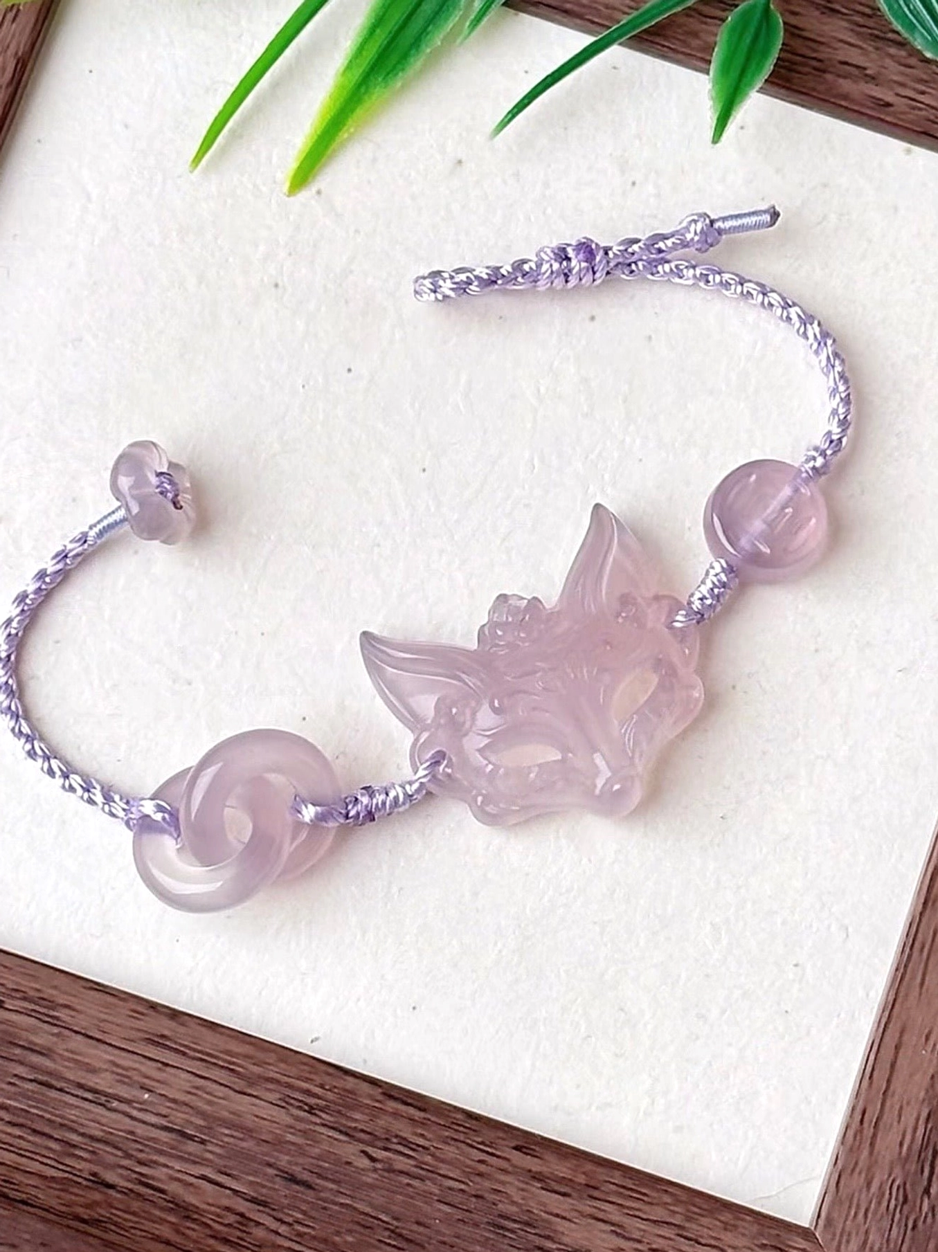 Adjustable natural agate fox spirit bracelet with translucent lavender fox charm, round agate bead, stone ring accents and braided Chinese cord closure