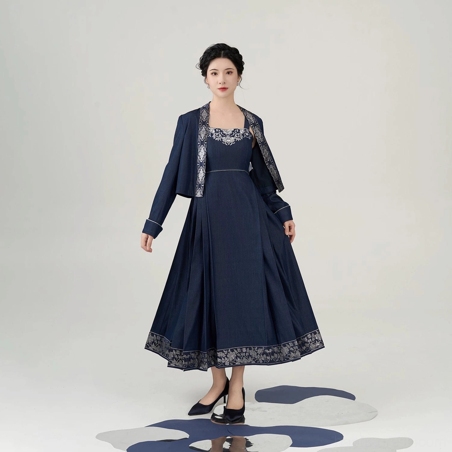 Front full body studio view of navy peony embroidered mamianqun inspired dress and cropped jacket full set