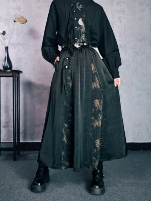 Dark teal New Chinese Style high-waisted bamboo print maxi skirt with flowing A-line silhouette, wide waistband, and oval metal buckle