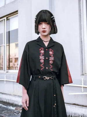 Front view of a New Chinese style snake embroidered shirt with relaxed drop shoulders, button closure, and contemporary Hanfu outfit styling