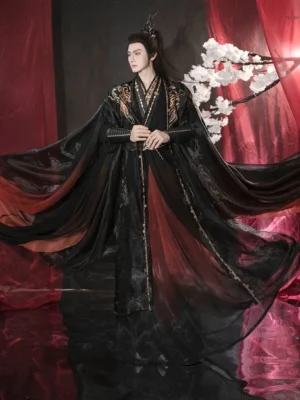 Full front view of Night Flame black and red Xianxia hanfu set for men with flowing wide sleeves and gold flame embroidery