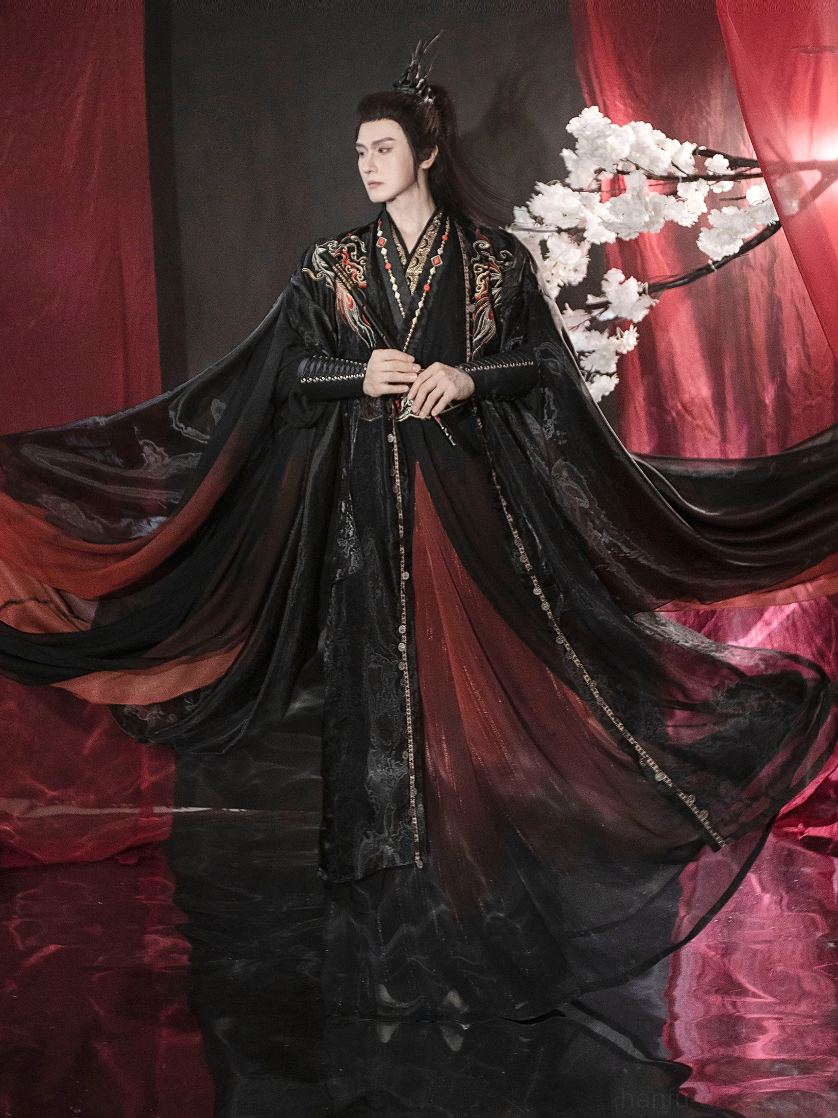 Full front view of Night Flame black and red Xianxia hanfu set for men with flowing wide sleeves and gold flame embroidery