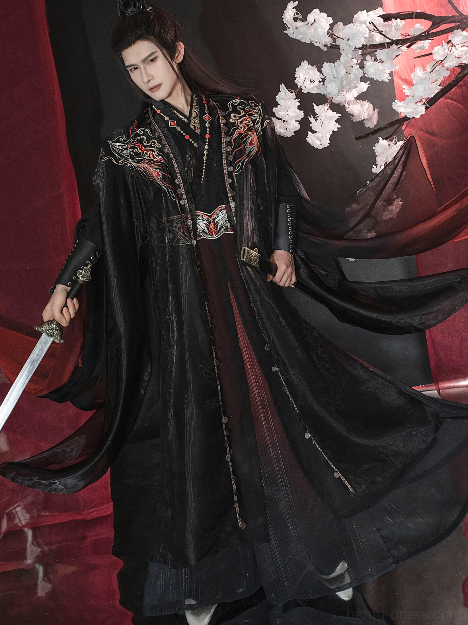 Full body male Xianxia warrior hanfu costume with sword, black and red layered robes, flame shoulder embroidery, and arm armor details
