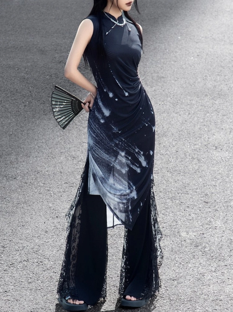 Three-quarter rear view of the Night Galaxy Chinese style cheongsam dress showing the fitted silhouette, stand collar, galaxy print, and sheer lace side panels with a black folding fan