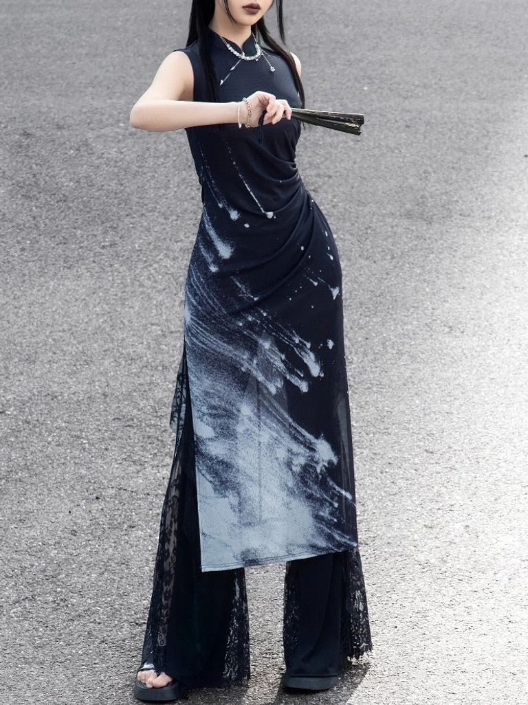Three-quarter front view of a woman wearing a Night Galaxy modern Hanfu sleeveless cheongsam dress with ink-wash starfield print, ruched waist, high side split, and sheer lace detailing