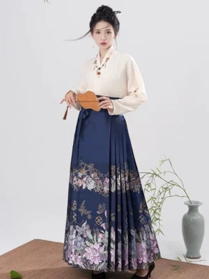 Full front view of Night Orchid Ming-style Mamianqun horse face skirt with navy blue pleats and orchid floral hem
