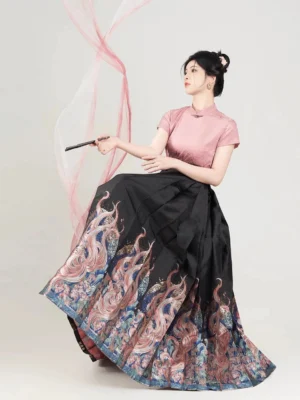 Nine-Tailed Fox Hanfu outfit with pink stand-collar blouse and black pleated mamian skirt, styled with a dramatic printed hem