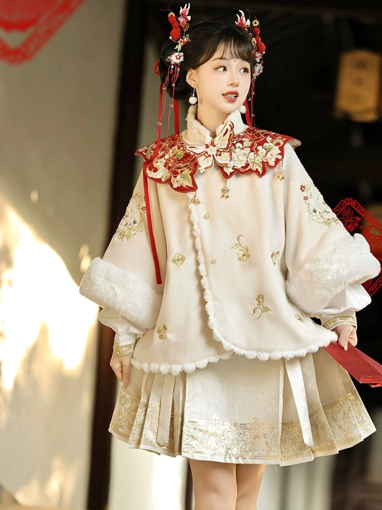 Off white embroidered modern Hanfu outfit with cloud collar pale cuff trim and short pleated mamianqun skirt