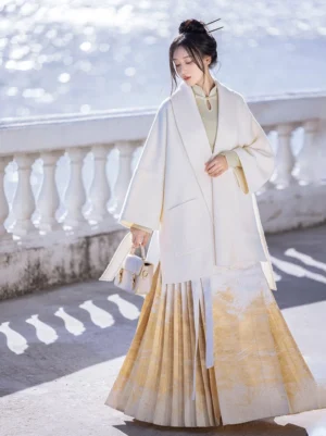 Off-white modern Hanfu 100% wool coat worn with a gradient horse-face skirt by a waterfront balustrade