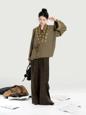 Olive green embroidered cross-collar jacket and dark brown wide-leg pants Modern Hanfu set front three-quarter full-body view