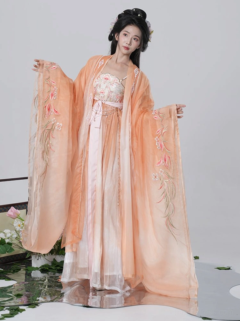 Orange gradient Tang Dynasty Hanfu Heziqun dress shown from the front with warm sunset-to-ivory colors, layered flowing skirt, embroidered camisole, and wide sleeves
