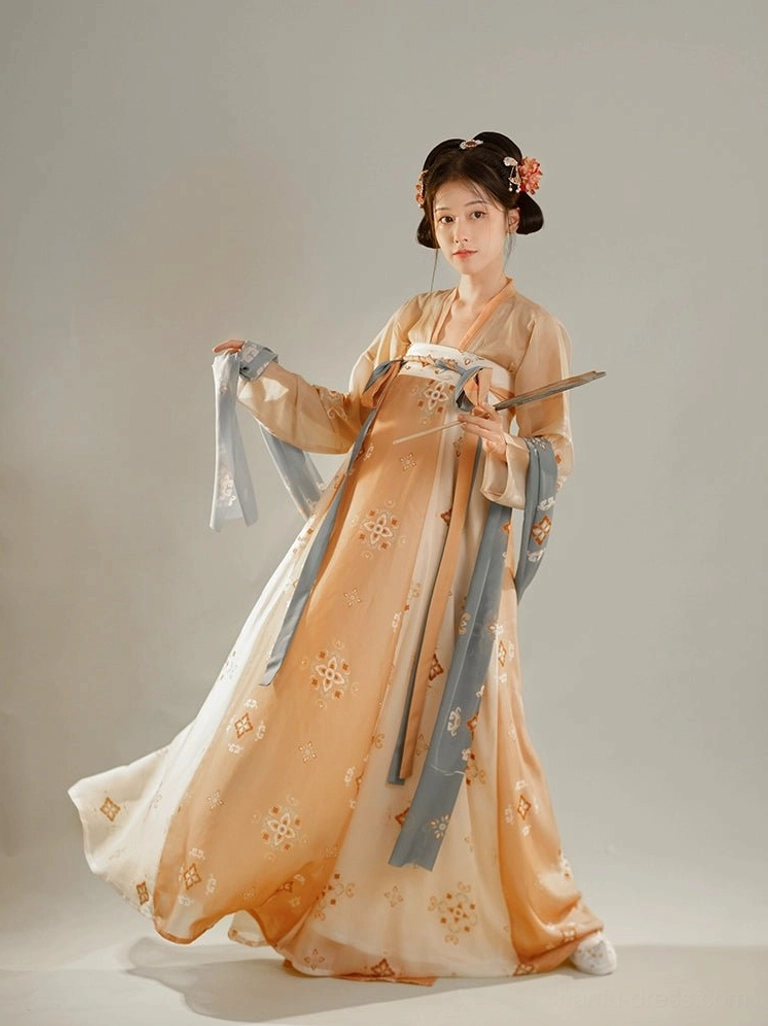 Full-body Tang Dynasty Hanfu model wearing an orange Qixiong Ruqun dress with floral print skirt and flowing sash