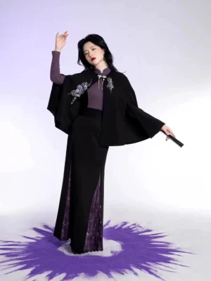 Oriental Witch modern Hanfu three-piece outfit with black embroidered cape purple knit top and pleated slit skirt shown from the front