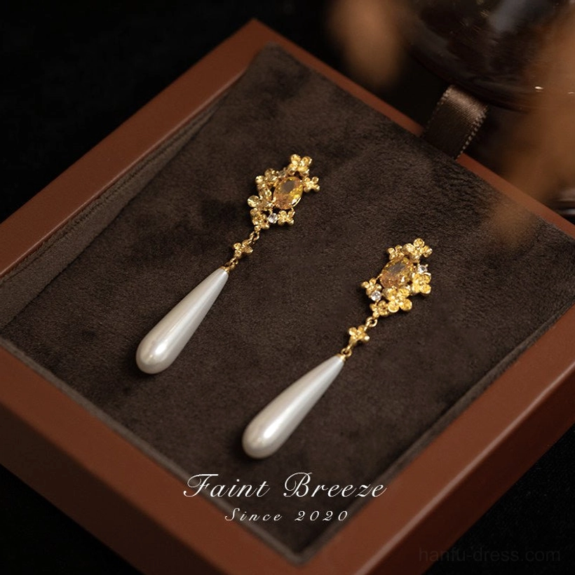 Osmanthus pearl drop stud earrings displayed as a pair in a brown velvet jewelry box for Chinese style accessories