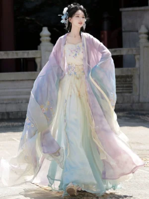 Tang Dynasty style Qiyao Ruqun Hanfu back three-quarter view showing pastel sheer outer layers and floral hair ornaments