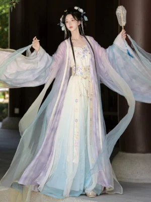Pastel Tang Dynasty Qiyao Ruqun Hanfu set front three-quarter view with floral embroidery wide sleeves and silk hand fan