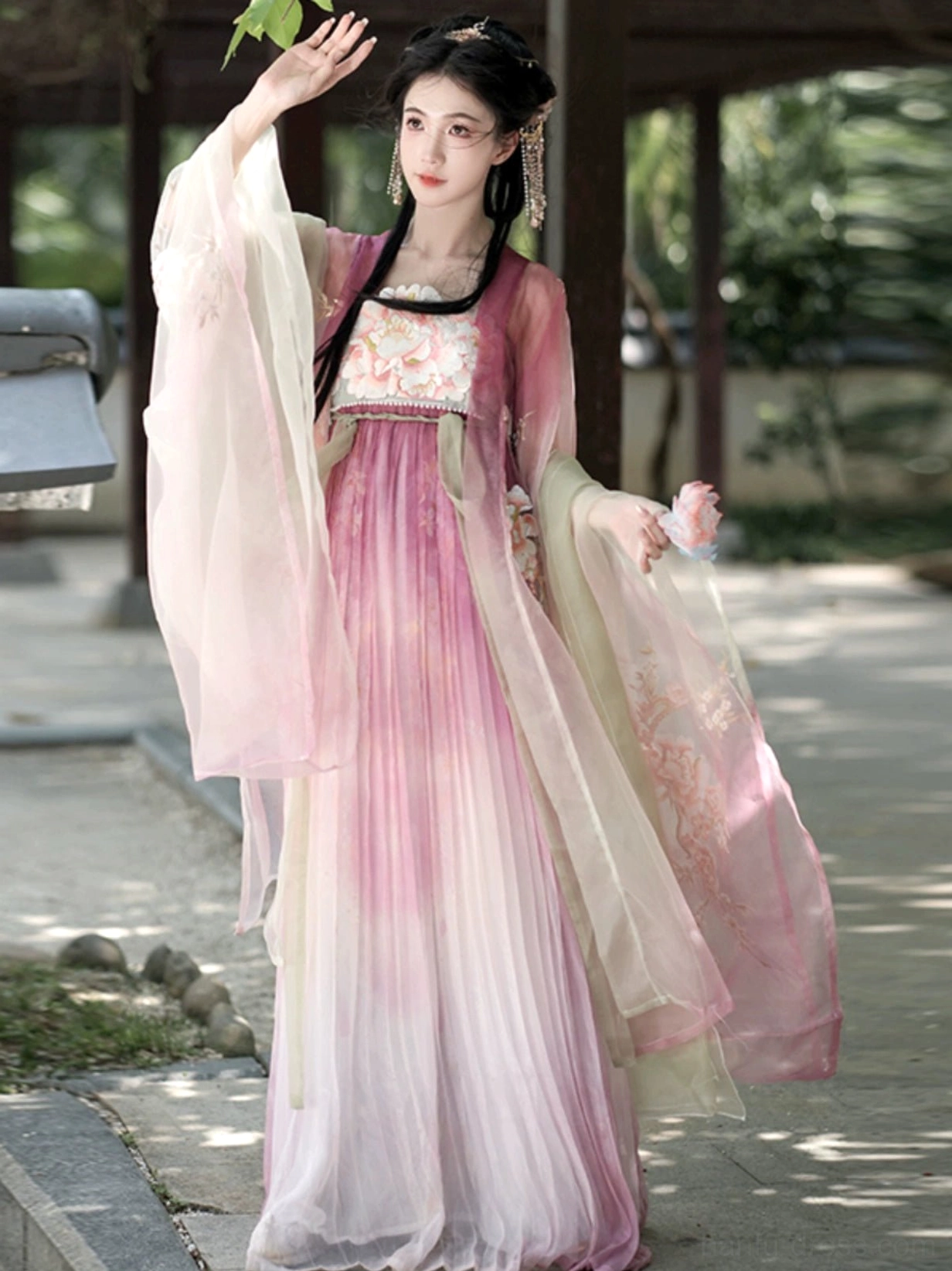 Close front view of Peach Blossom God Hanfu with embroidered floral bodice, soft pink fabric, and delicate traditional Chinese costume styling