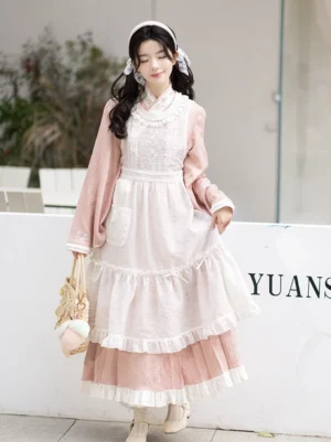 Full front view of pink modern Hanfu cross-collar dress with white layered ruffle styling and woven tote bag