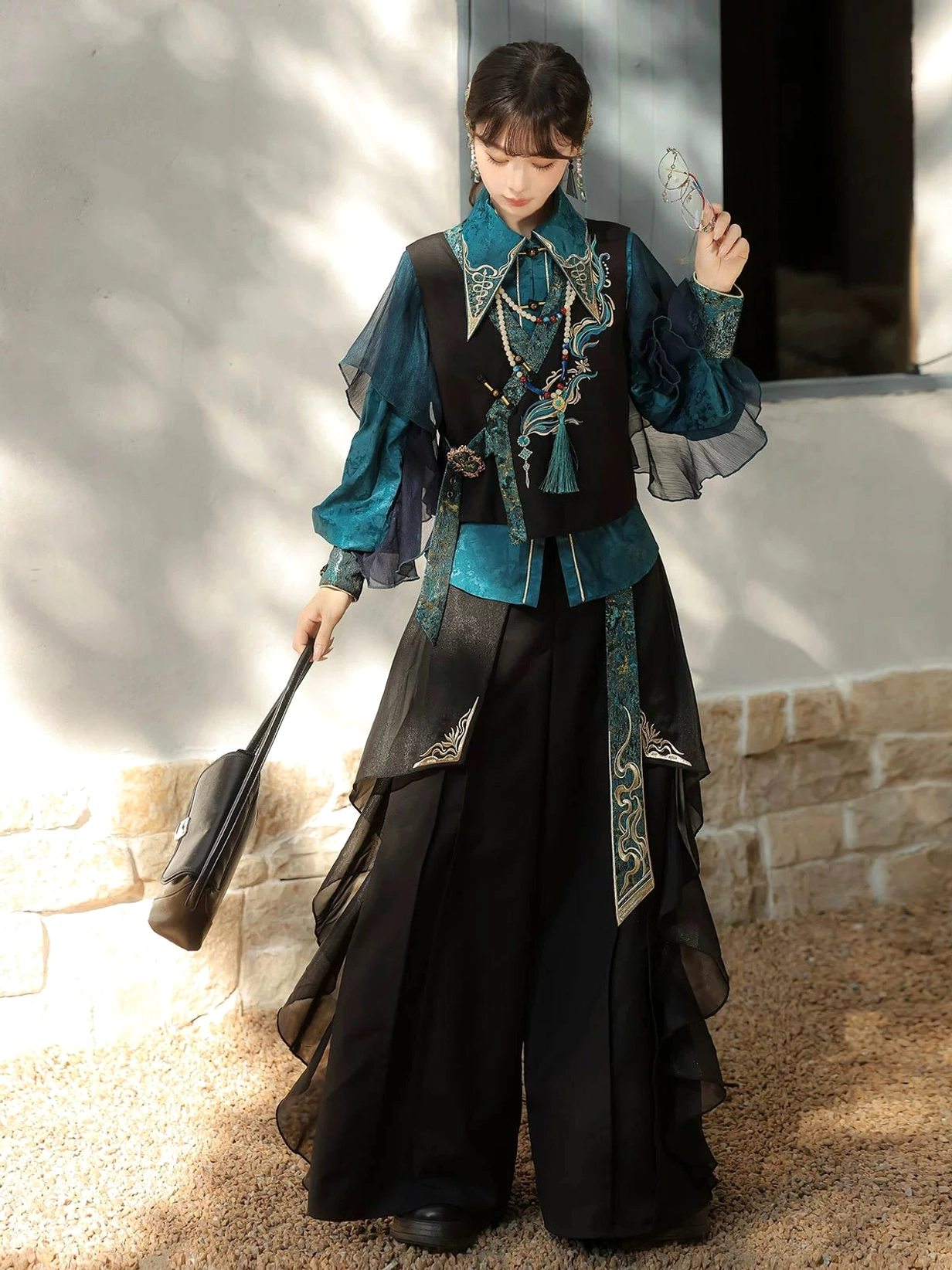 Front view of women’s peacock blue modern Hanfu outfit with embroidered vest, blouse, and layered wide-leg pants