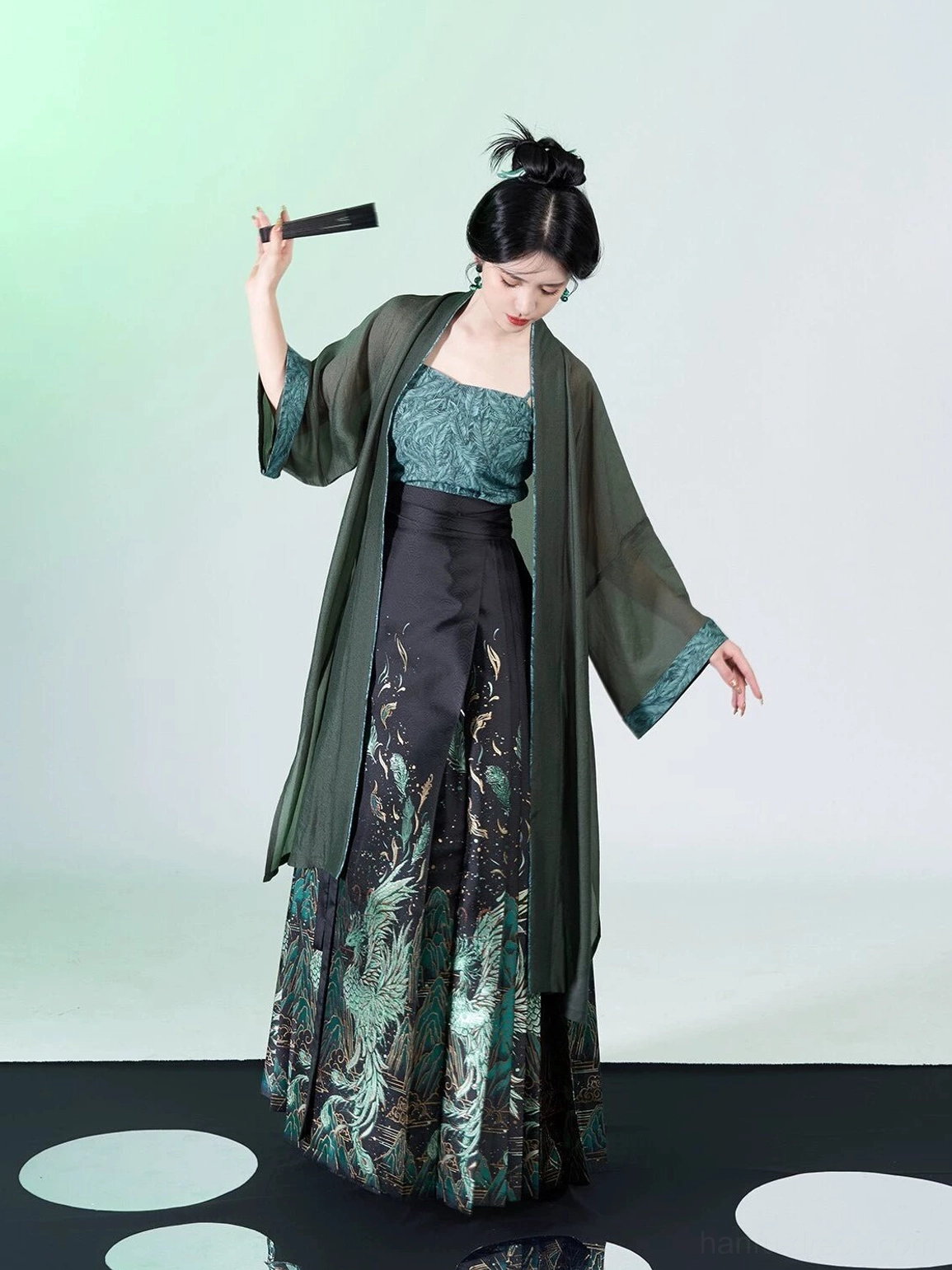 Full length peacock feather Hanfu set showing lightweight sheer overcoat teal camisole and pleated black mamian skirt