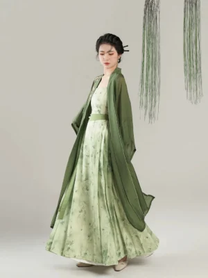 Song Dynasty Hanfu Pear Blossom Begonia set side view showing flowing sheer green overcoat and pleated floral maxi dress