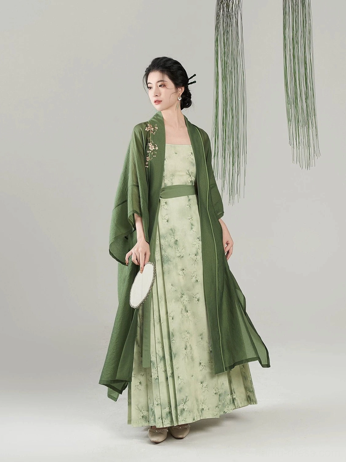 Full Pear Blossom Begonia Song Dynasty modern Hanfu outfit with embroidered green overcoat, pleated floral dress and flowing layered silhouette