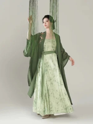 Pear Blossom Begonia Song Dynasty inspired modern Hanfu full set with sage floral dress and dark green embroidered overcoat front three quarter view