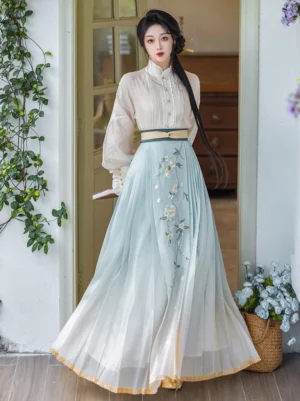 Pear Blossom Song Ming Dynasty Hanfu with ivory standing collar blouse and blue cream gradient embroidered mamianqun skirt front view