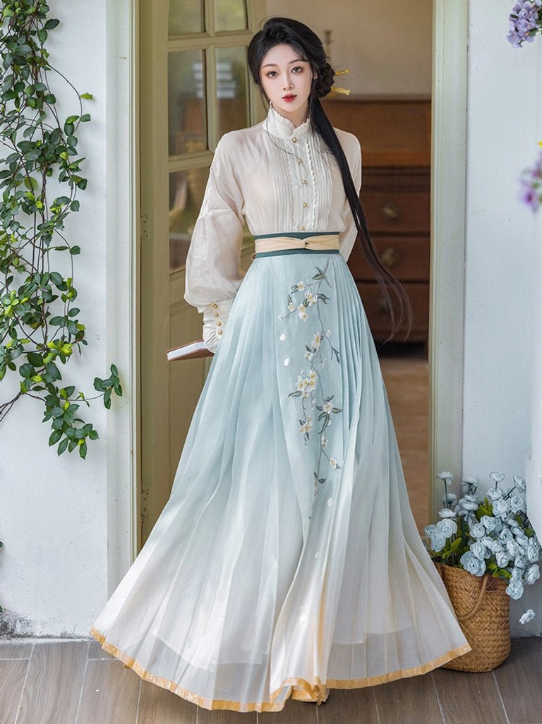 Pear Blossom Song Ming Dynasty Hanfu with ivory standing collar blouse and blue cream gradient embroidered mamianqun skirt front view