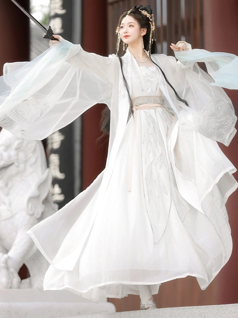 Side front view of Song Dynasty style white Hanfu with silver feather embroidered skirt, pale blue sleeve trim and decorative sword