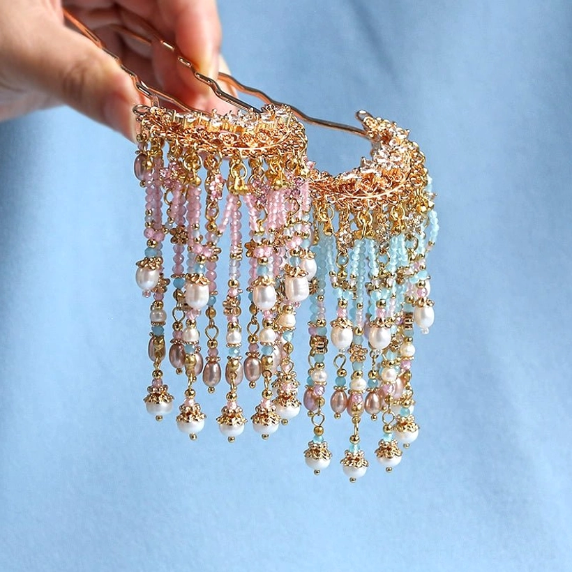 Close-up of Pearl Princess Chinese Hanfu U-shaped hair pin with gold-tone sticks, gradient bead tassels, and pearl-style drops