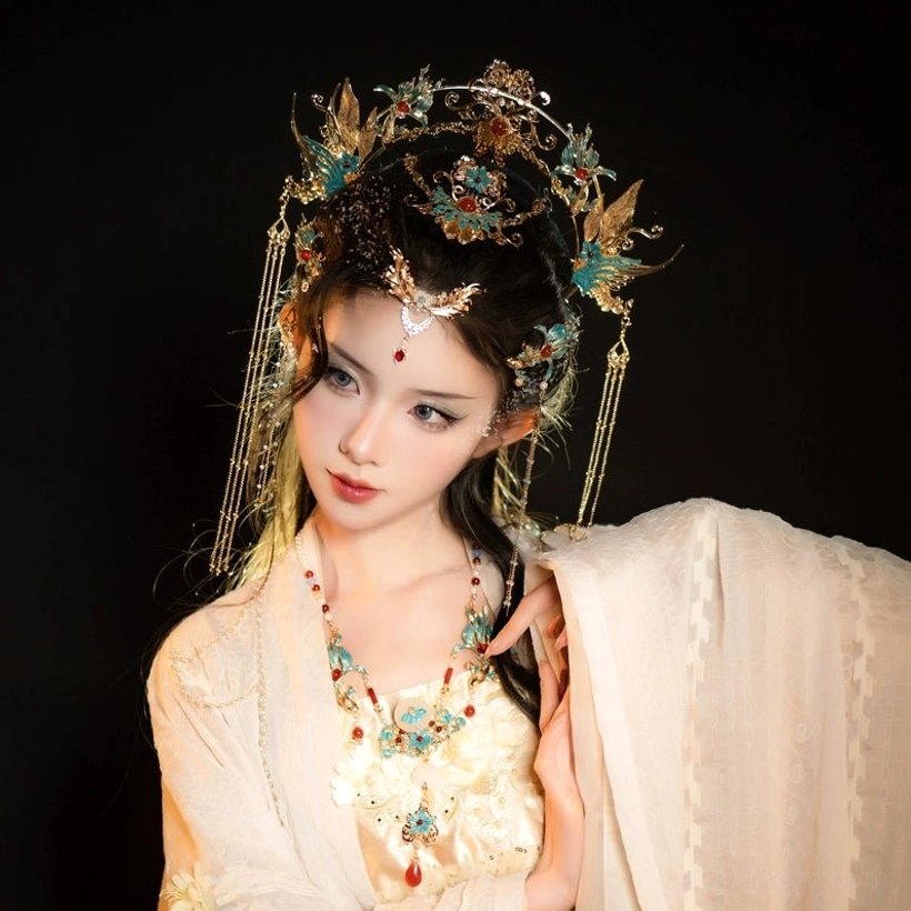 Phoenix carp Hanfu hair accessory complete set worn with beige traditional Chinese Hanfu against black background