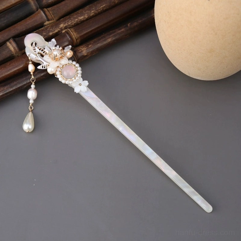 Short tassel traditional Chinese hair stick with iridescent shaft, mini floral ornament, pink stone, pearl accents, and teardrop pendant
