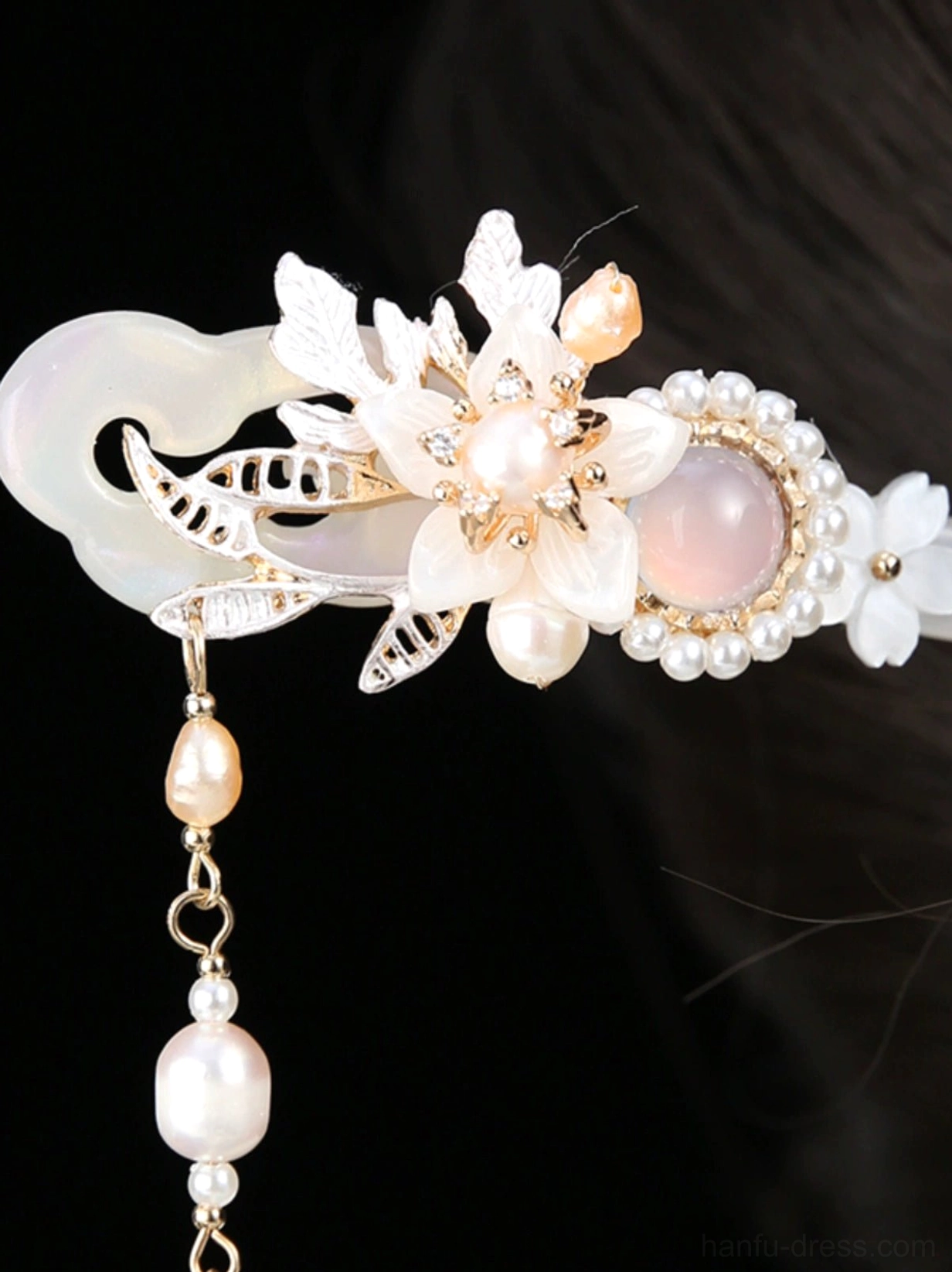 Vintage Chinese floral hairpin with white jade-like cloud base, gold filigree leaves, pink gemstone, white flowers, and layered pearl tassel