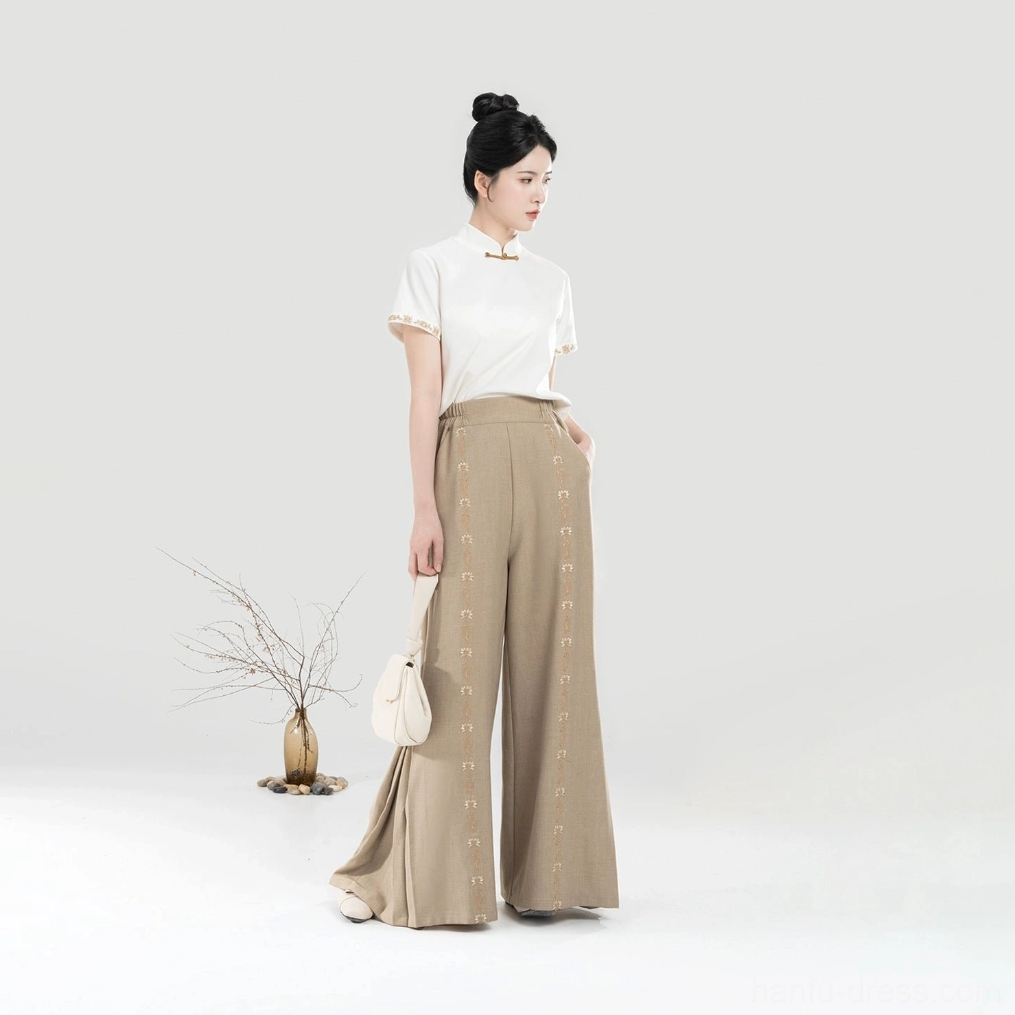 Full Pinewood modern Hanfu set with white Mandarin collar top khaki wide-leg pants and decorative side buttons