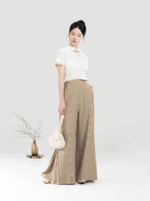 Pinewood modern Hanfu full set with ivory Mandarin collar short sleeve top and khaki wide-leg pants side view