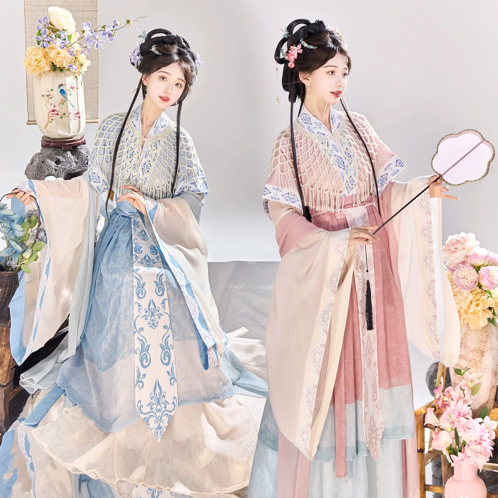 Matching pink and blue Wei Jin Dynasty Qiyao Ruqun Hanfu outfits displayed side by side with flowing sheer sleeves, layered skirts, and embroidered traditional Chinese costume details