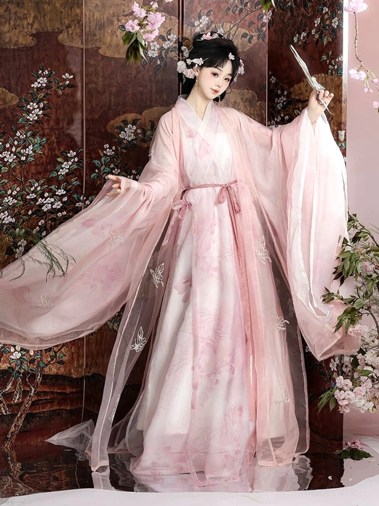 Pink Han Dynasty inspired Hanfu robe with butterfly floral embroidery, floor-length straight hem, wide sleeves, waist sash, and folding fan