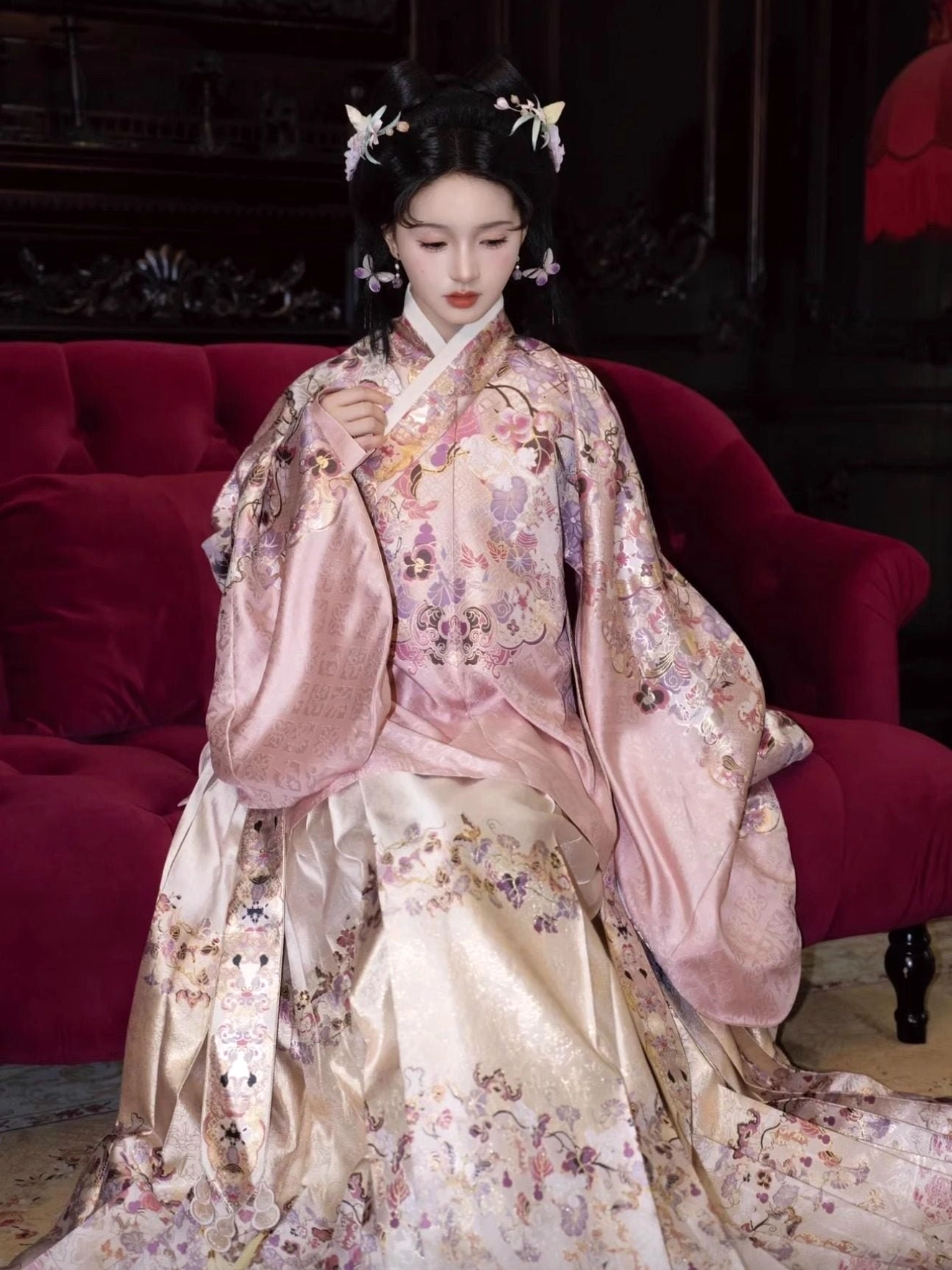 Full length pink floral Chinese hanfu outfit with oversized embroidered sleeves and floor-length Ming style mamian skirt